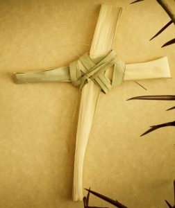 This Handmade Cross of Palm Branch leaves, surround by a Crown of Thorns represents Palm Sunday, Jesus's Good Friday Crucifixion and his rising on Easter Sunday